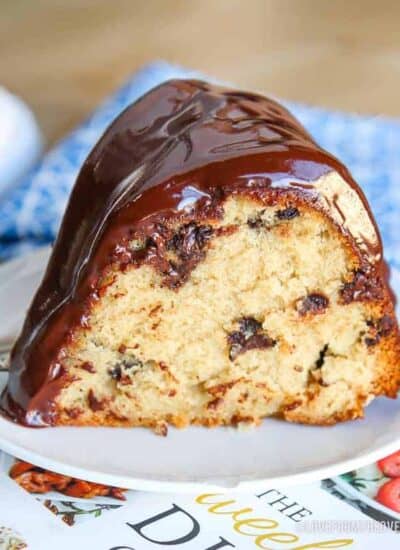 a slice of Chocolate Chip Bundt Cake on a white pan