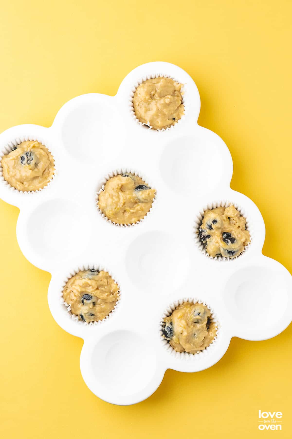 step by step photos showing how to make blueberry banana bread