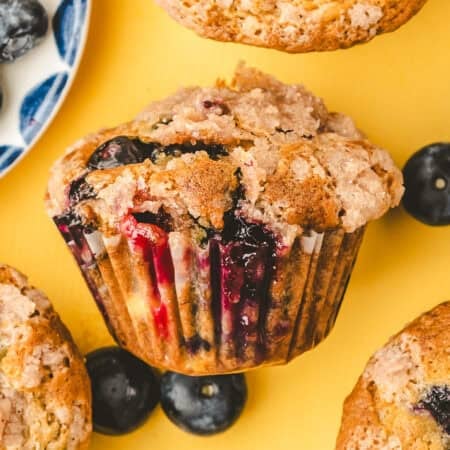 A blueberry banana muffin on it's side.