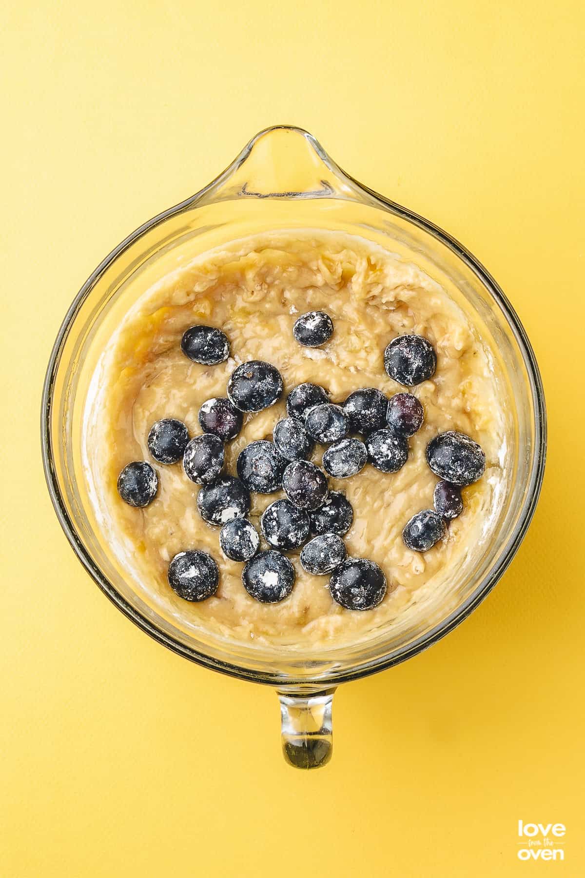 step by step photos showing how to make blueberry banana bread