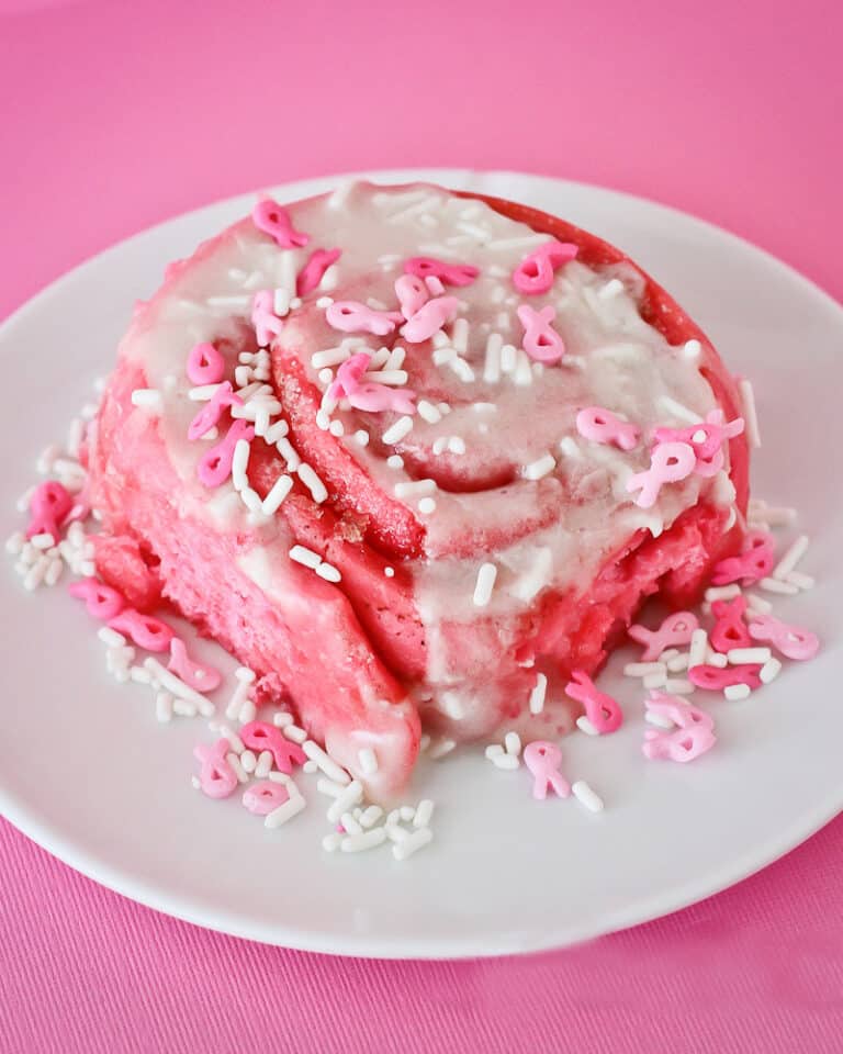 A pink cinnamon roll.