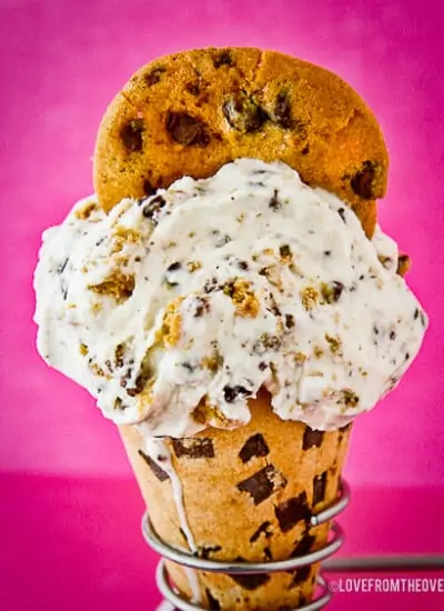 A photo of a chocolate chip cookie ice cream cone.