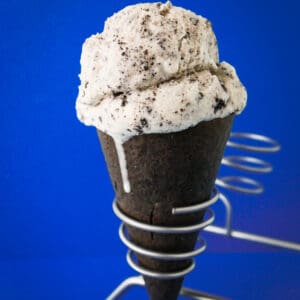 A photo of a cookies and cream ice cream cone made in a cuisinart ice cream recipe.