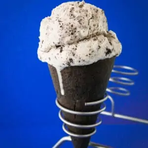 A photo of a cookies and cream ice cream cone made in a cuisinart ice cream recipe.
