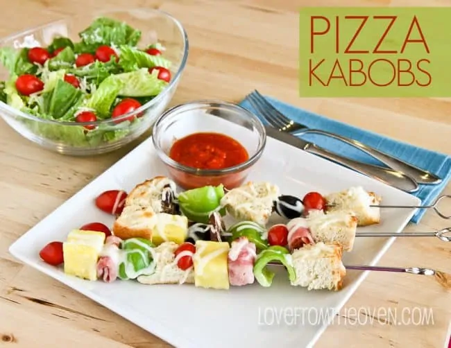 A plate of pizza kabobs 