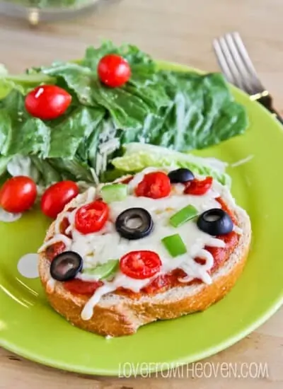 A plate of food with Pizza