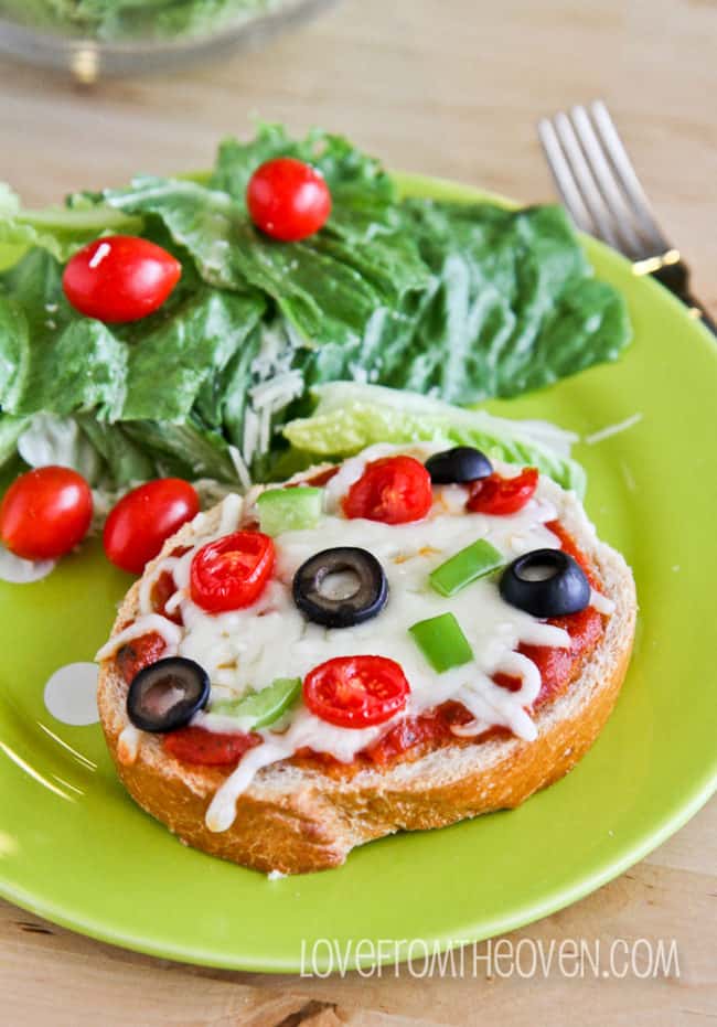 A plate of food with Pizza 