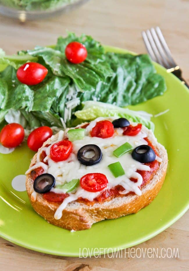 A plate of food, with Pizza