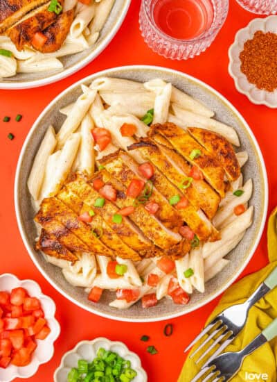 a bowl of cajun chicken pasta