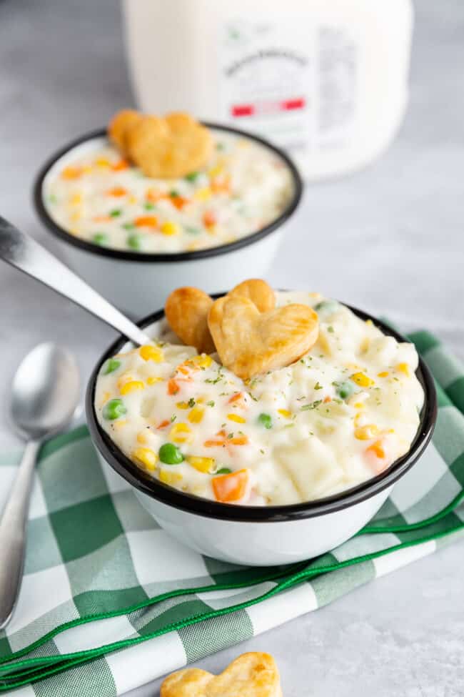 Two bowls of soup on a table