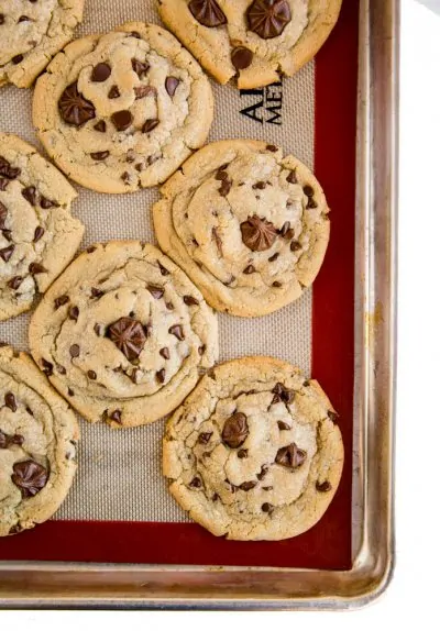 Chewy chocolate chip cookies on a baking sheet