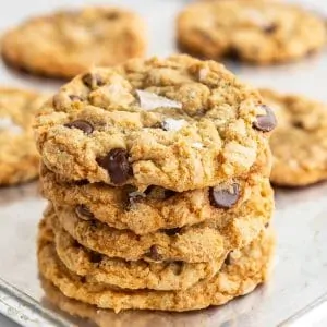 stack of crispy chocolate chip cookies on a cookie sheet