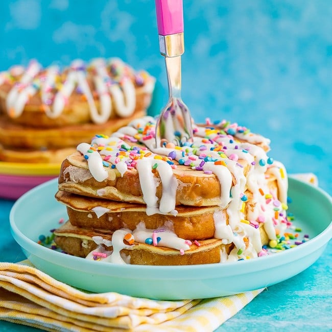 French toast with sprinkles and frosting on top 