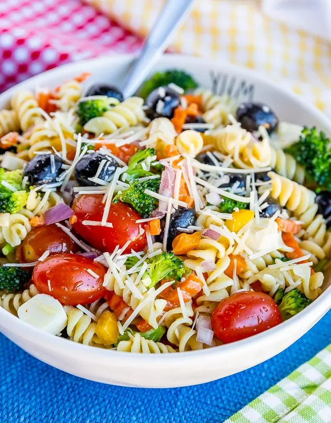 Bowl of pasta salad on a blue placemat