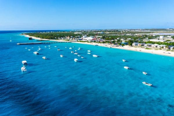 View of Caribbean on a Princess Cruise with blue water, boats and island