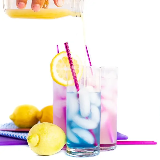 Blue and purple cocktails with lemons 