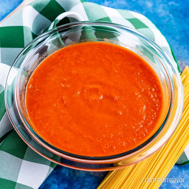 A close up of a bowl of tomato sauce