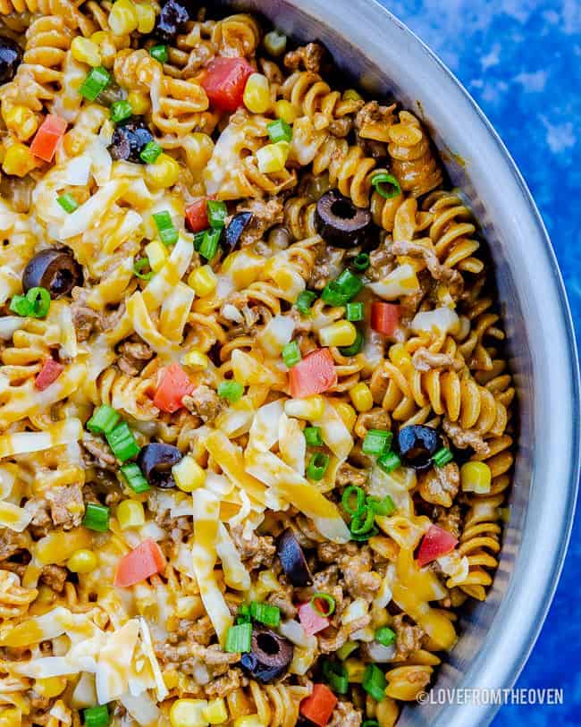 A bowl of food, with Pasta and Taco