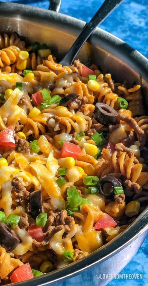 A bowl filled with pasta and vegetables