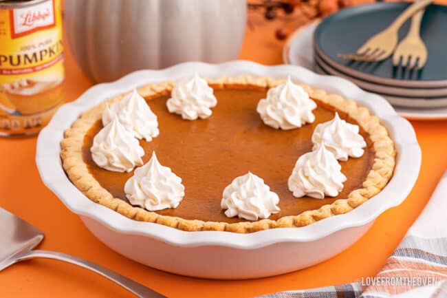 a libbys pumpkin pie on an orange background