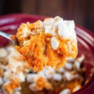 A spoonful of sweet potato casserole