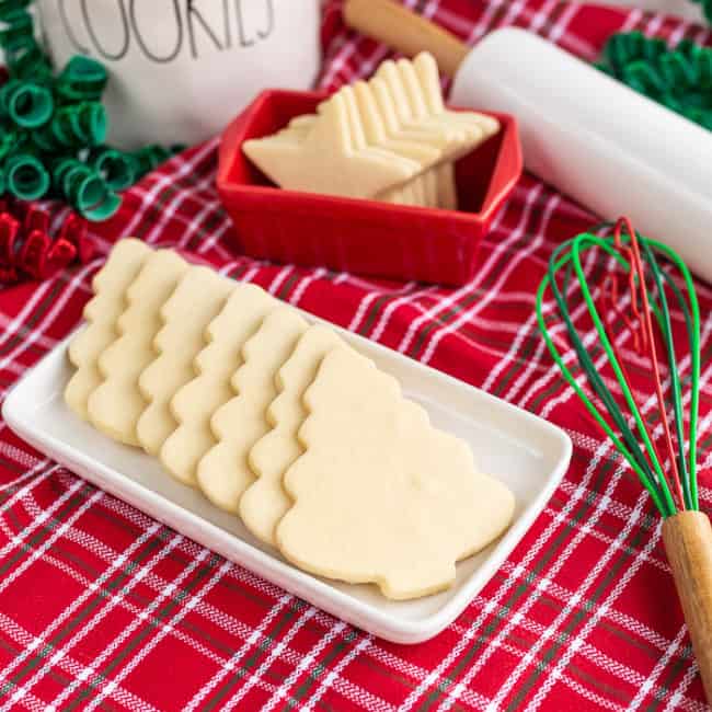 Christmas tree shaped cookies on a white tray