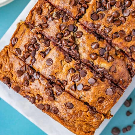 a loaf of chocolate chip banana bread that has been sliced