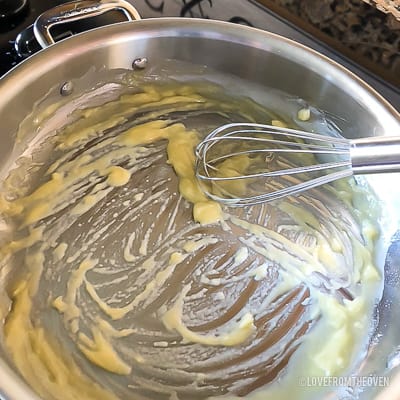 Base for green bean casserole in a stainless steel pan