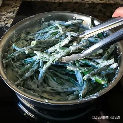 Green beans in a stainless steel pan