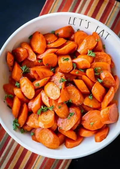 Glazed carrots in a white bowl