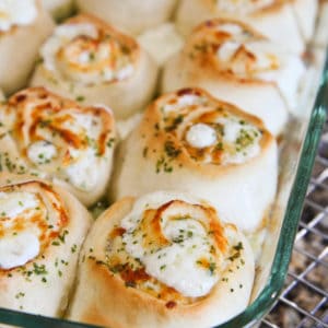 Garlic rolls in a glass baking pan