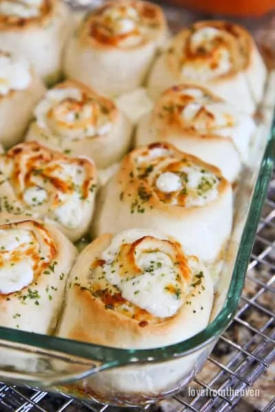 Garlic rolls in a glass baking pan