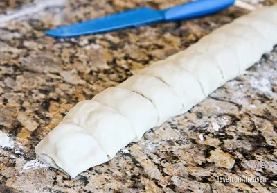 Cut dough for garlic rolls