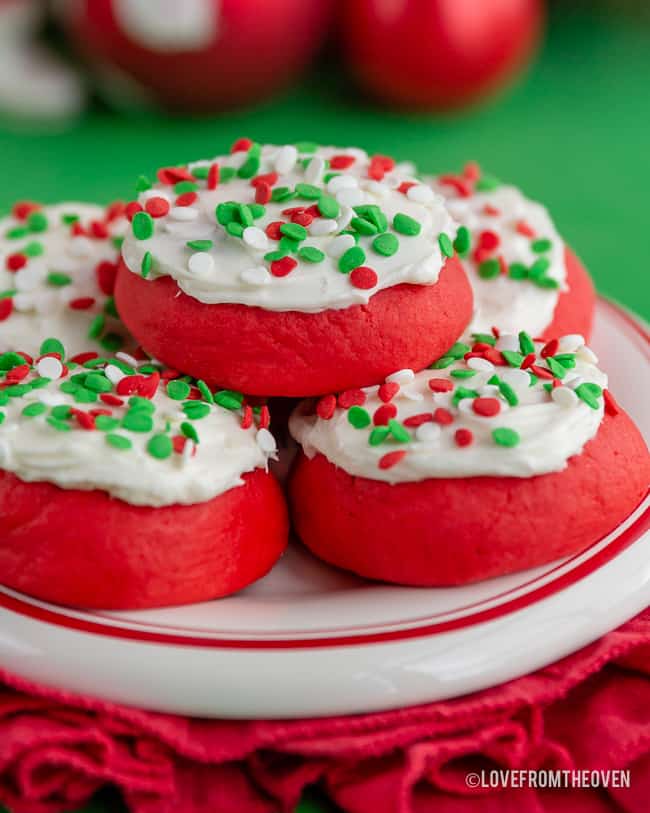 Lofthouse style cookies on a red and white plate with a red napkin