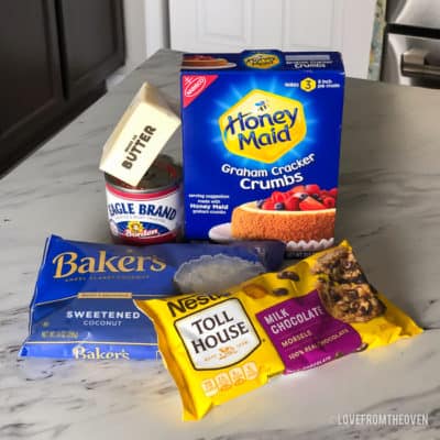 Ingredients for magic cookie bars on a white countertop