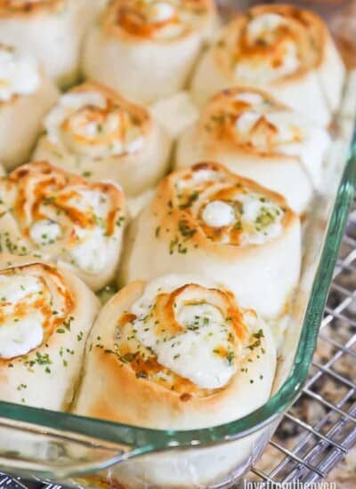 Garlic rolls in a glass baking pan