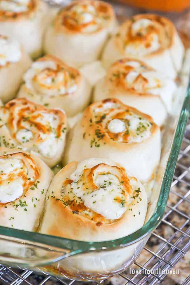 Garlic rolls in a glass baking pan