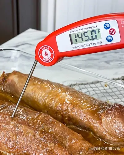 Meat thermometer reading 145 degrees Fahrenheit