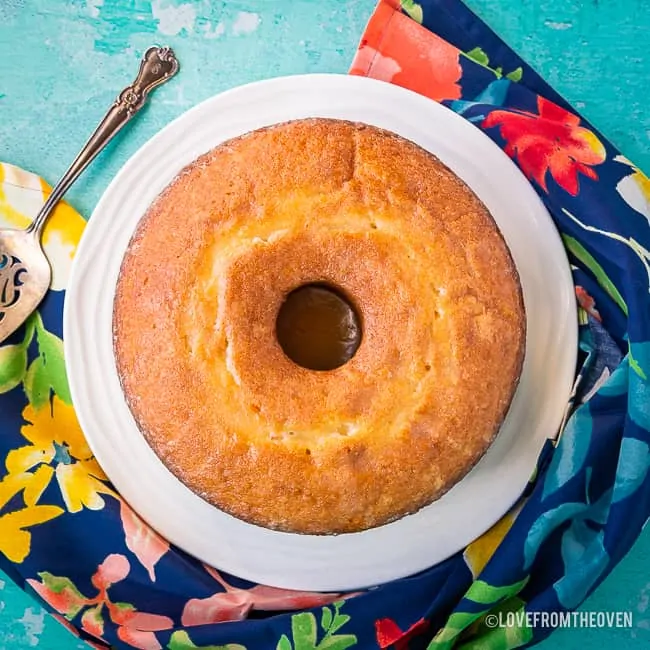 Kentucky butter cake on a plate with a blue floral napkin