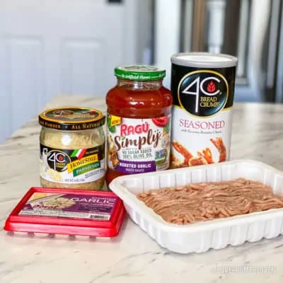 Ingredients for chicken parm meatballs in their containers
