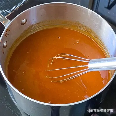 Enchilada sauce in stainless steel pot