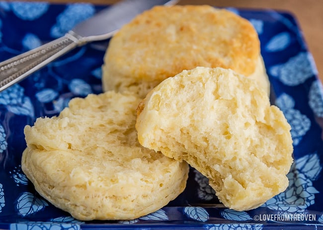 A close up of a plate of food, with Biscuits