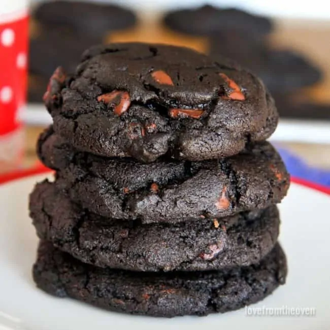 A stack of chocolate chocolate chip cookies