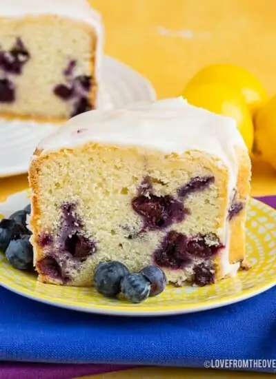 A piece of lemon blueberry cake on a plate,