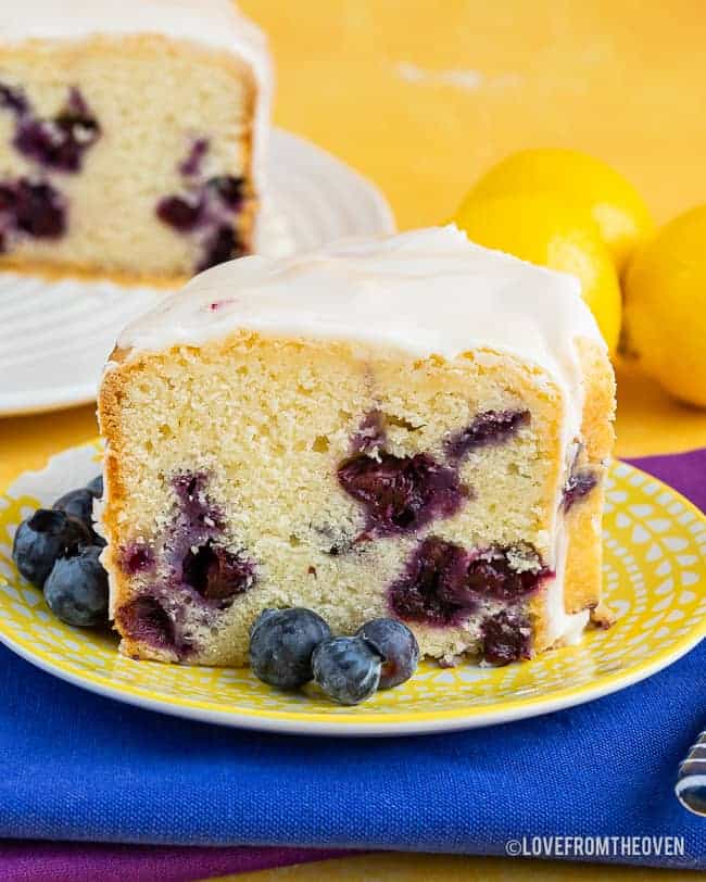 A piece of lemon blueberry cake on a plate,