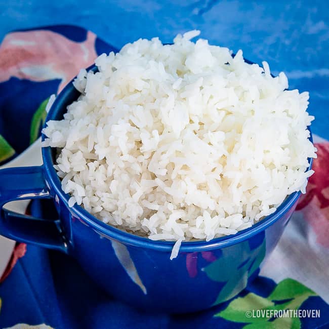 A blue bowl full of rice