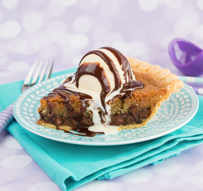 A slice of Chocolate chip cookie pie with ice cream