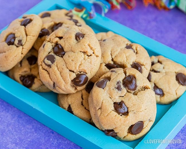 a pile of chocolate chip peanut butter cookies