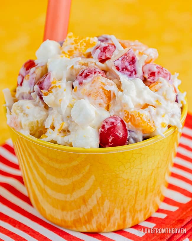 Yellow bowl holding ambrosia fruit salad