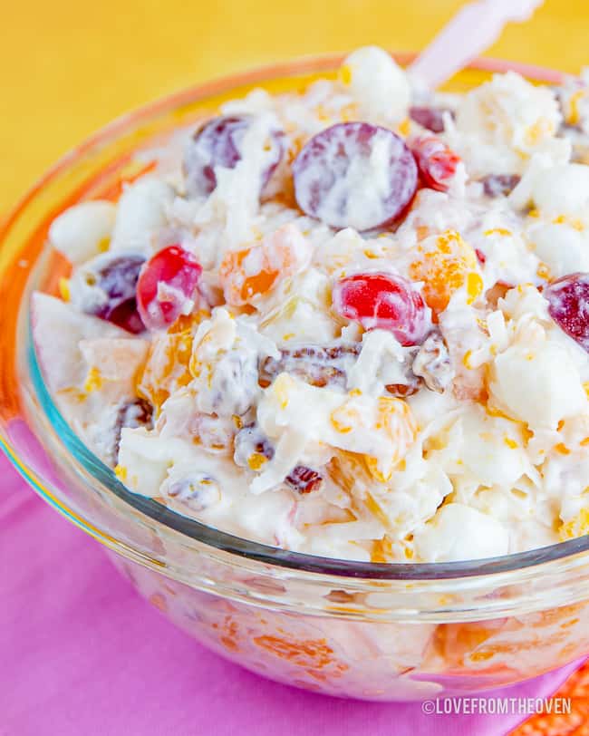 Ambrosia fruit salad in a glass bowl